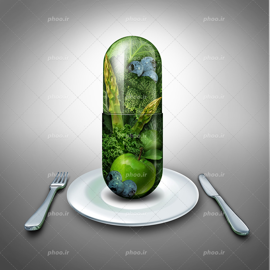 عکس با کیفیت کپسول قرص پر شده از سبزیجات تازه داخل ظرف و کارد و چنگال در کنارش