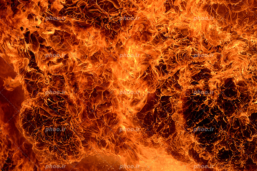 عکس با کیفیت زبانه کشیدن شعله های داغ آتش از نمای نزدیک