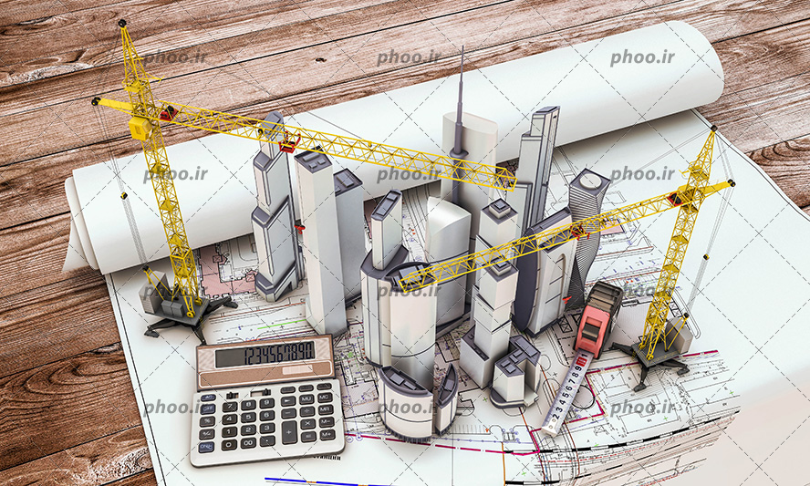 عکس با کیفیت ساختمان های نیمه ساز و تاور کرین های سه بعدی انیمیشنی در کنار متر و ماشین حساب بر روی نقشه