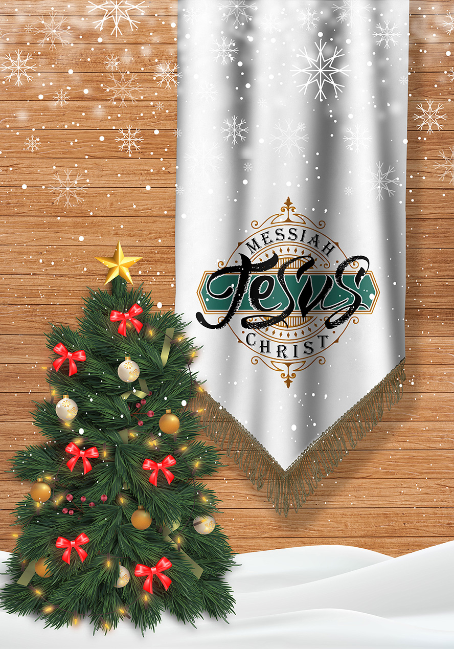 عکس با کیفیت پارچه به رنگ سفید و نام حضرت مسیح بر روی پارچه و درخت کریسمس در برف ها